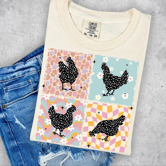 Folded t-shirt with chicken pattern on a concrete surface