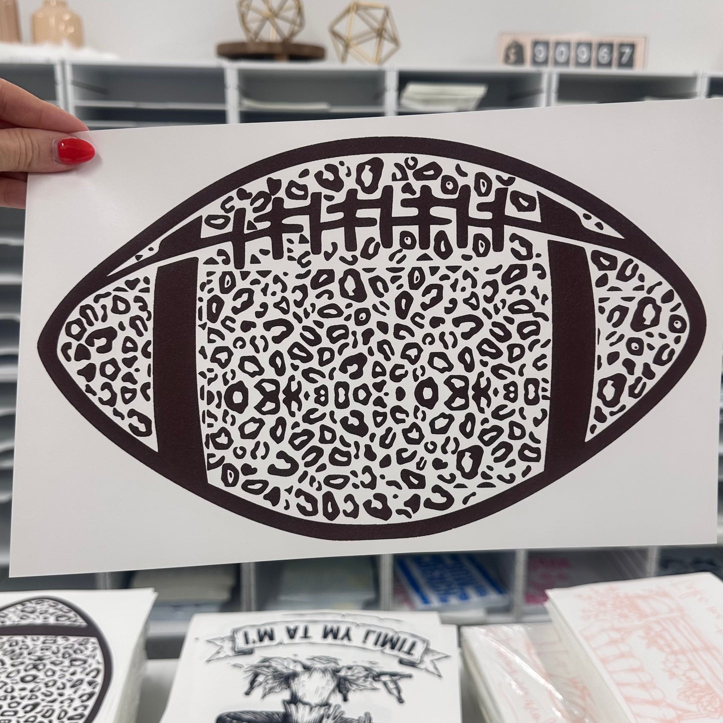 Leopard football brown ink screen print transfer•