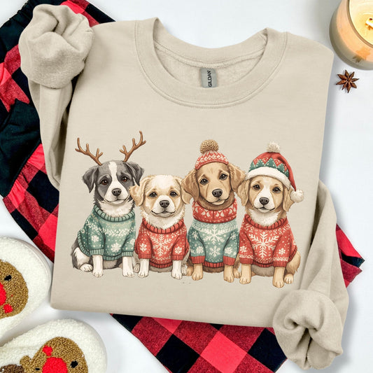 Beige sweatshirt with four dogs in Christmas sweaters and hats on a white background.