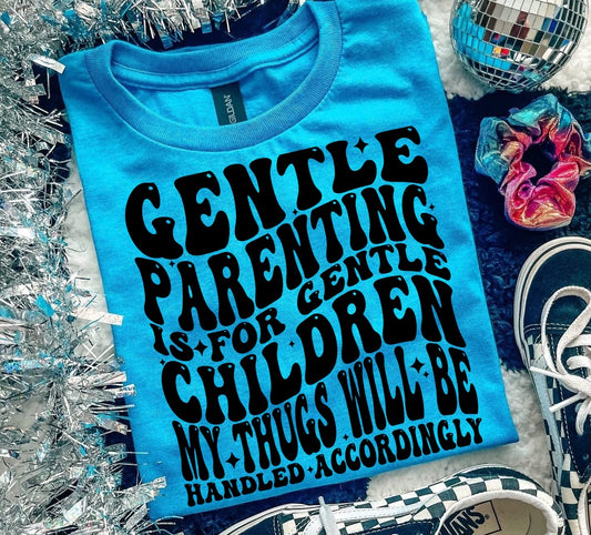 Blue t-shirt with humorous text, checkered sneakers, and decorative items on a textured surface.